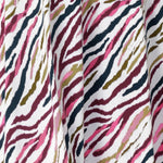 Close up image of Rainbow Zebra print used by Australian clothing brand Leina & Fleur to create a collection of workwear shirts and dresses. Crafted on Australia Made dry touch jersey fabric that has soft stretch and provides full body comfort. 