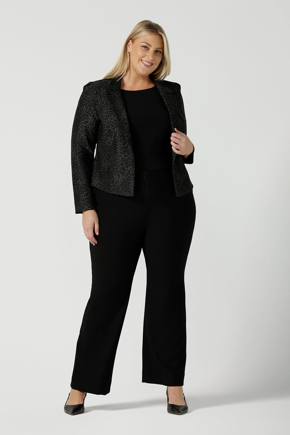 A size 18 woman wearing the Raleigh Jacket in Leopard print. Printed Ponti tailored jacket that is easy care and has a matching pant. Comfortable and easy care. Made in Australia for women size 8 - 24.