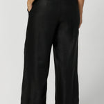 Back darts create a flattering shape, while side front pockets add practicality. With straight-cut, wide legs and a full-length fit, the Ronnie Pant exudes effortless style and comfort. 