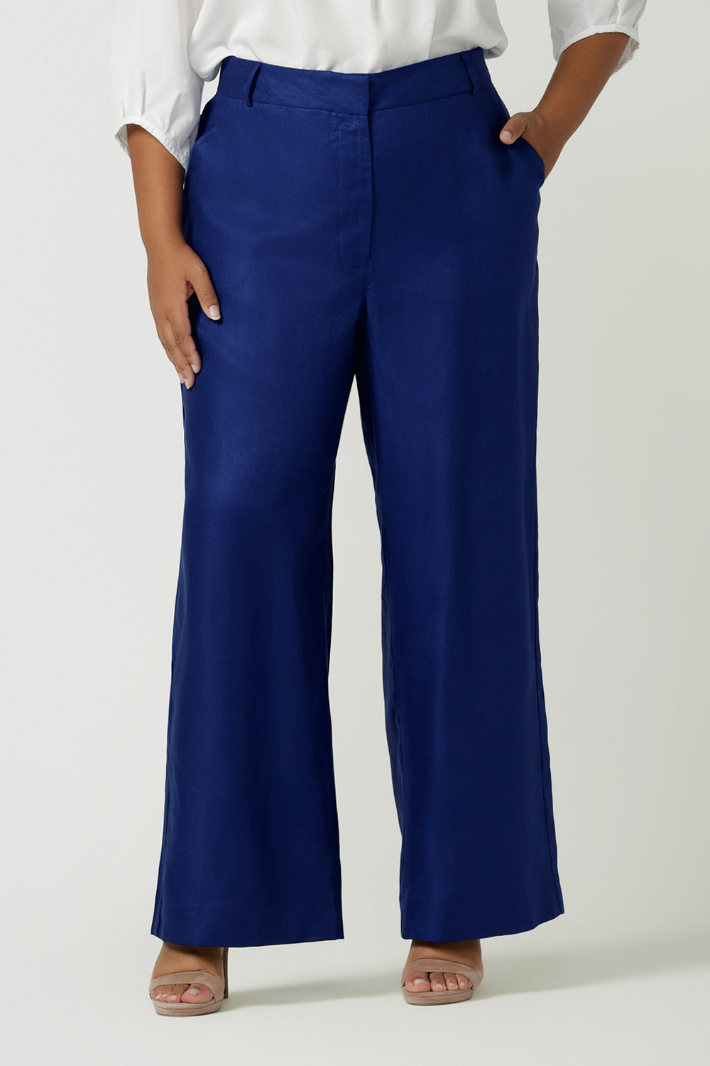 High waist Ronnie pant in high waist linen. Styled back with a white Arley shirt and heeled shoes. Made in Australia for women size 8 - 24.