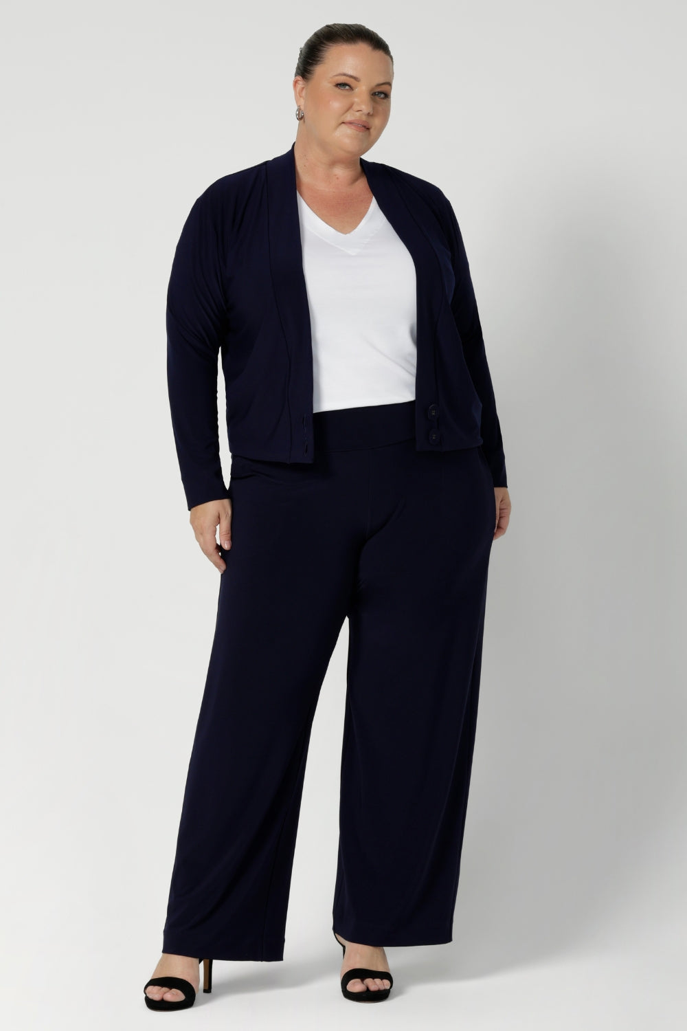 Jacket/ cardigan hybrid was designed to ease into the cooler months with style & comfort. Made from stretchy dry touch jersey fabric for back to work comfort. Made in Australia by clothing brand Leina & Fleur in sizes 8-24.