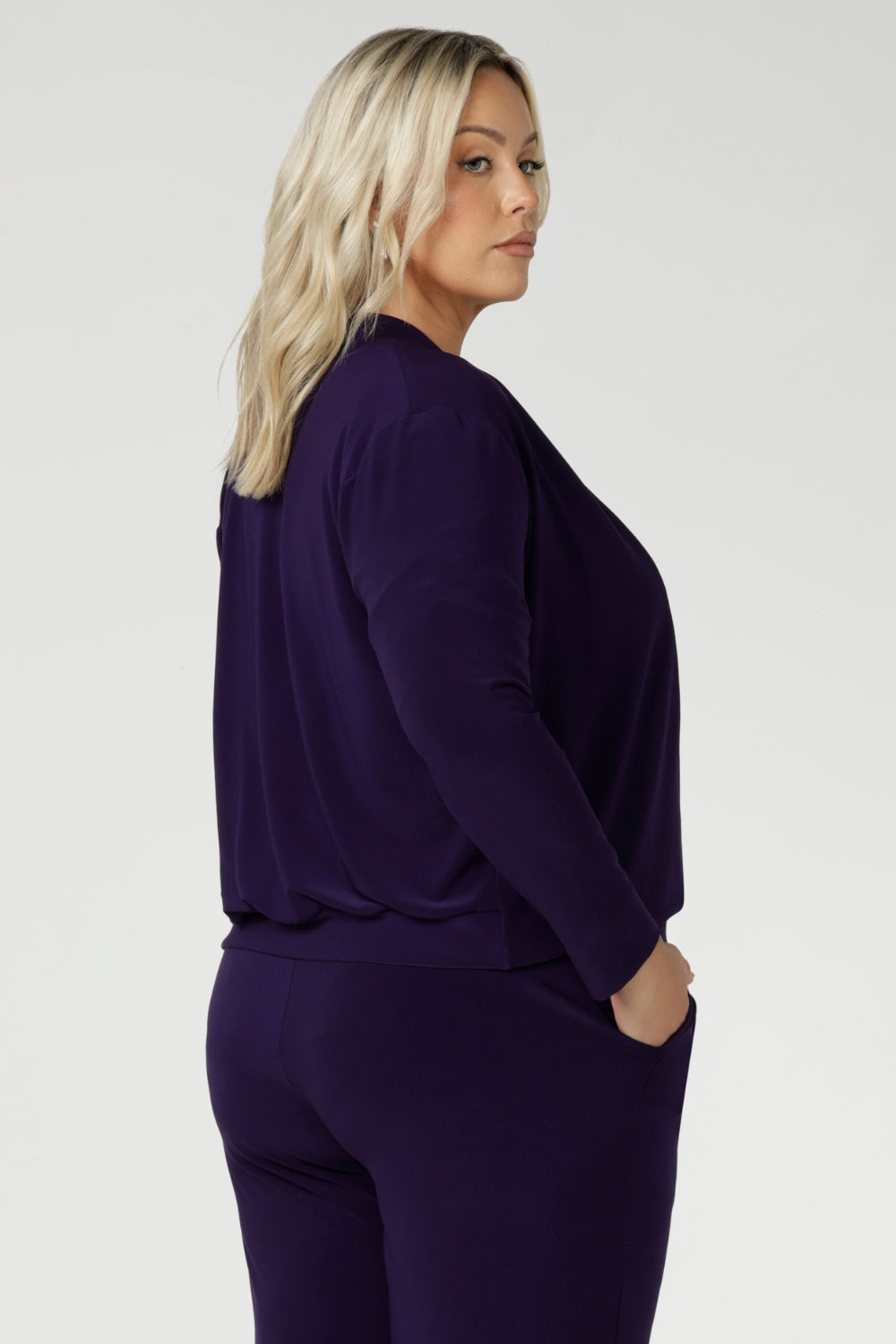 Available in Purple with more colors coming soon, the Sandro Jacardi is the perfect addition to your work wardrobe, seamlessly pairing with dresses or other pieces from our Fluid Suiting collection.