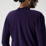 The folded neckband with crossover detail at the center-back adds a unique touch of design, making this cardigan stand out. The double-layer front lining ensures structure and durability, while the buggy lining at the back provides extra comfort and a smooth fit.