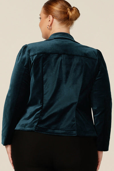 Back view of a tailored occasionwear jacket for women with a single-button fastening, collar and notch lapels and tailored fit. In petrol green Velveteen, this suit jacket has the look and feel of a velvet jacket - perfect for cocktail party wear and eveningwear! 
