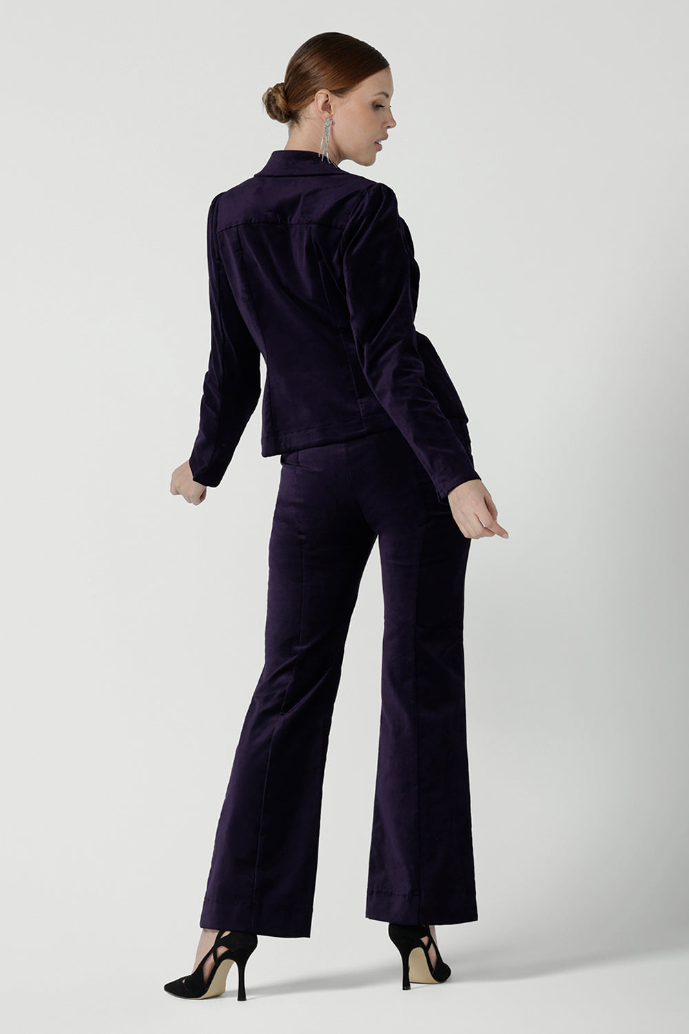 Back view of a Jonas pant in Purple Velveteen is a kick flare pant made in purple velveteen fabric. Cocktail pant suit sets. Made in Australia for women size 8 - 24.