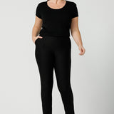 A good black top for your capsule wardrobe, this round neck, short sleeve top in black bamboo jersey is comfortable for work and casual wear. Worn with slim leg black work pants, both are made in Australia by ladies clothing brand, Leina & Fleur. Shop black tops for women online in sizes 8 to 24 in L&F's online fashion boutique