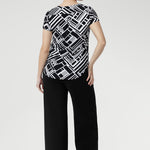 The Sawyer Top is a wardrobe essential that transitions seamlessly from smart workwear to casual weekend looks.