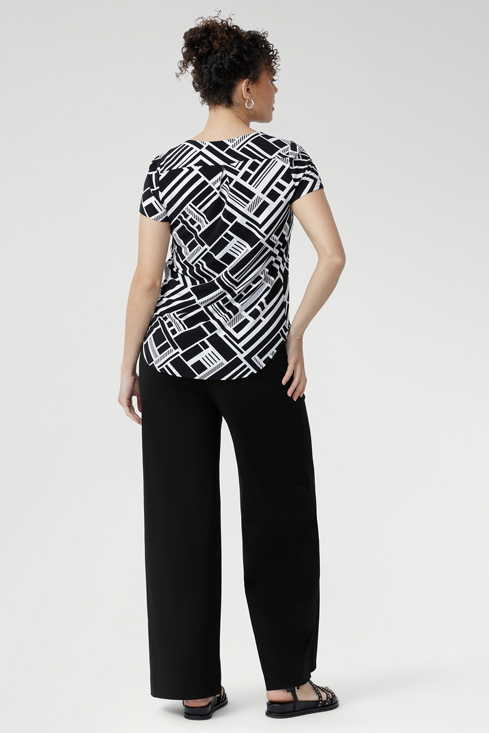 The Sawyer Top is a wardrobe essential that transitions seamlessly from smart workwear to casual weekend looks.
