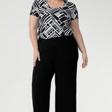 The Sawyer Top is a women's blouse with scoop neckline and pairs beautifully with skirts, trousers, and denim for effortless everyday styling. Short sleeved top is perfect for everyday styling and fits comfortably under blazers. 