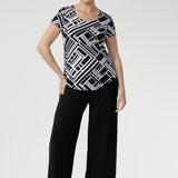 The Sawyer Top is a wardrobe essential that transitions seamlessly from smart workwear to casual weekend looks. Lightweight, wrinkle-resistant, and easy to pack, it’s an ideal travel piece for women who value both style and practicality.