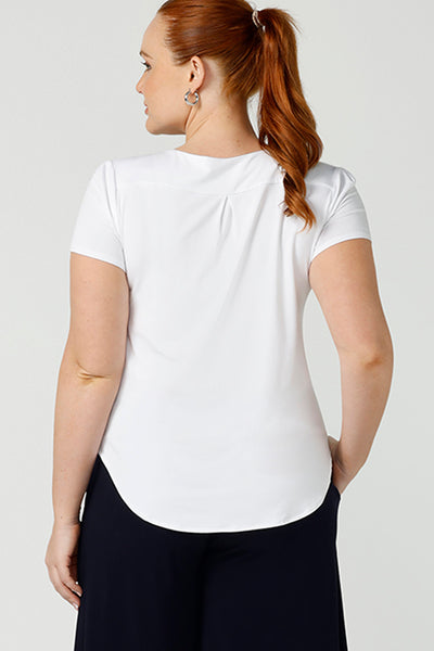 Back view of a round neck, short sleeve top in white bamboo jersey byAustralian and New Zealand ladies clothing brand, Leina & Fleur, is shown in a size 12 on a curvy woman. If you're seeking a ladies casual top then this white tee top by Australian women's online clothing brand, Leina & Fleur, is the perfect edition to your capsule wardrobe!