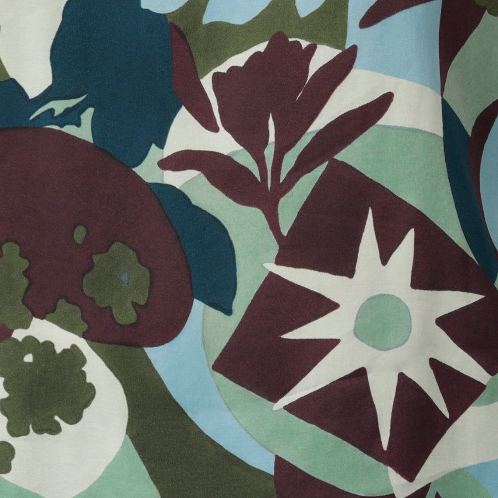 Elevate your wardrobe with the new Scandi Abstract statement print. Each piece of this collection is crafted from a luxurious sateen-weave fabric that feels as silky as it looks. The bold abstract print blends rich tones of green, blue, and plum. Australian Made collection available in sizes 8-24.