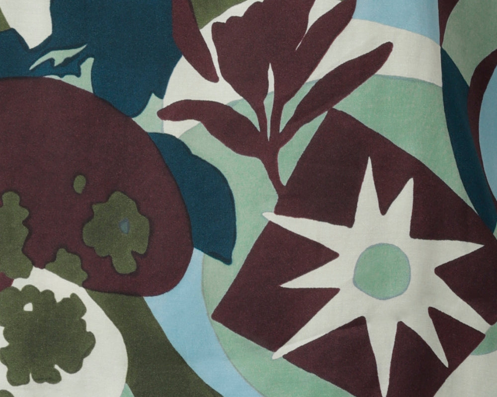 Elevate your wardrobe with the new Scandi Abstract statement print. Each piece of this collection is crafted from a luxurious sateen-weave fabric that feels as silky as it looks. The bold abstract print blends rich tones of green, blue, and plum. Australian Made collection available in sizes 8-24.