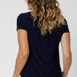 Back view image of womans workwear top avaialable for pre order. Choose from three sleeve options—cap sleeve, elbow sleeve, or 3/4 length sleeve—you can choose the one that best suits your personal style or the season. In sizes 8-24.