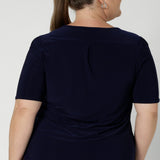 The ultimate travel essential, this top is both comfortable and easy to pack, making it perfect for those on the go. Shirttail hem allows for the option for a tucked in look or elegantly left out over bottoms of choice. Size 8-24.