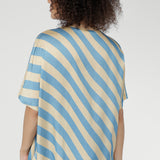 Finished with a straight hemline, this versatile pull-on style pairs seamlessly with tailored pants, denim, or skirts. Lightweight and breathable, it’s ideal for warm-weather layering or standalone wear.