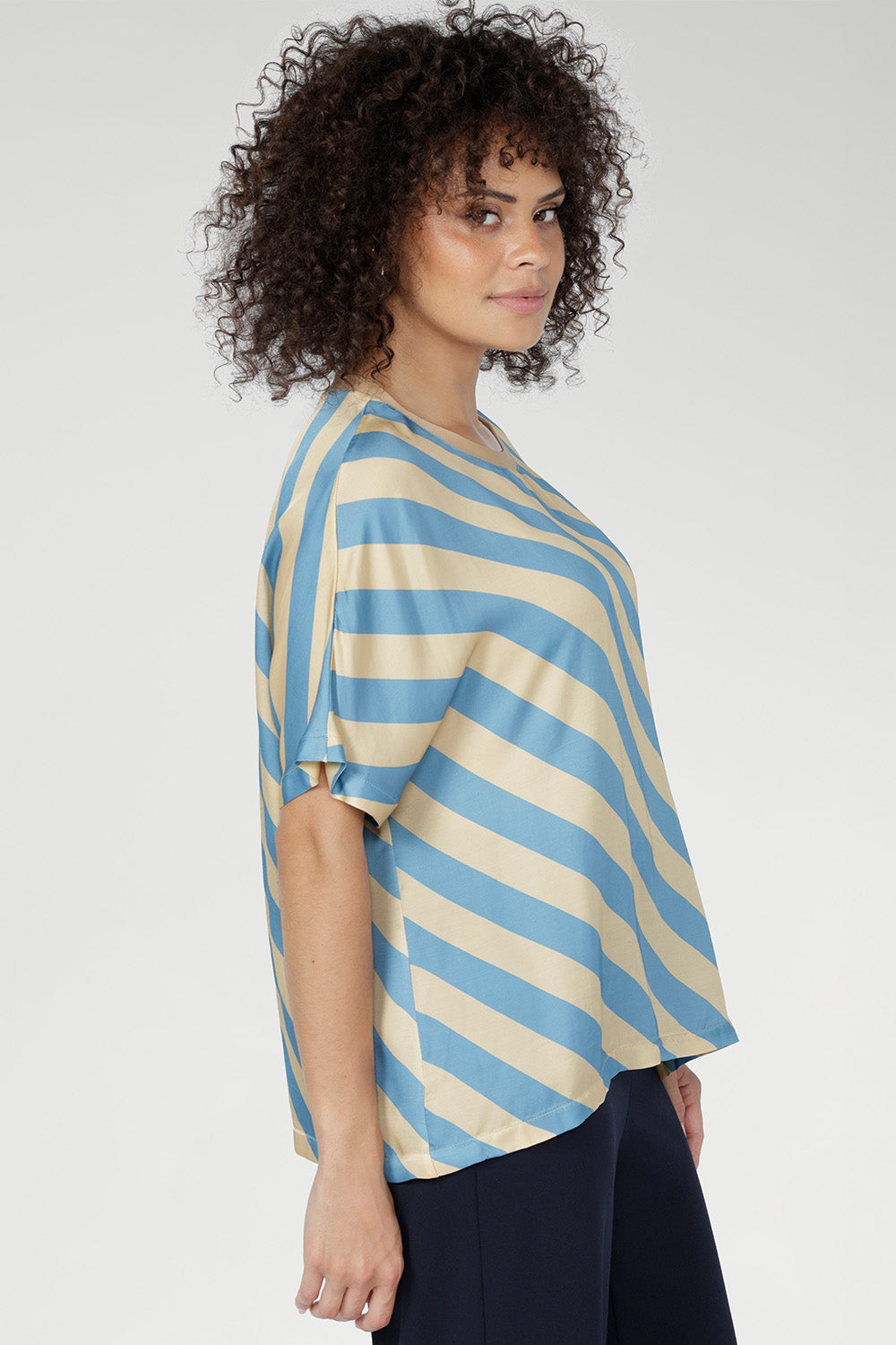 Featuring a clean round neckline with a soft bound finish, the Scout Tee delivers comfort with a polished edge. The grown-on sleeves create an easy, flattering shape that feels relaxed yet considered.