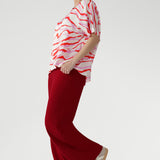 The Pink Tang print brings an artistic touch of colour and modernity to a timeless silhouette—perfect for pairing with tailored pants or casual denim. Made in Australia with integrity.