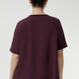 Discover effortless everyday style with the Scout Tee in Plum — expertly crafted from premium Tencel Viscose, renowned for its lightweight feel and soft finish. Light Weight top for women is Australian made and stocked in sizes 8-24.