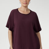 Expertly crafted from premium Tencel Viscose, renowned for its lightweight feel and soft finish. Light Weight top for women is Australian made and stocked in sizes 8-24. Size 10 model pairs her t-shirt with charcoal coloured pants. 