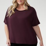 Plus size women wears Australian-made staple features a relaxed silhouette with grown-on sleeves, a bound round neckline for all-day comfort, and a clean, straight hem for a polished look. 