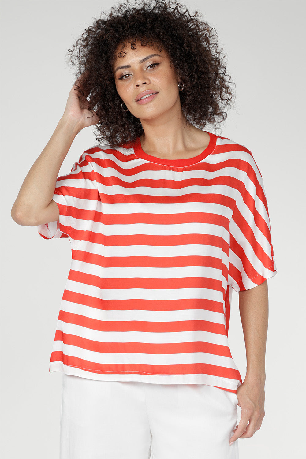 Designed in a relaxed fit with grown-on sleeves and a softly bound round neckline, this tee delivers an easy, flattering silhouette you’ll reach for again and again. 