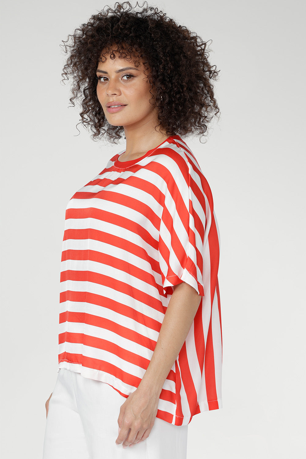 The Tang Stripe, blending fresh red and vanilla hues, adds a modern twist to timeless stripes—perfect for casual styling or layering under jackets and knits.