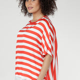 The Tang Stripe, blending fresh red and vanilla hues, adds a modern twist to timeless stripes—perfect for casual styling or layering under jackets and knits.