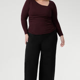 For a more refined and statement-making choice, the Simmi Top in Wine delivers a bold touch of sophistication to your wardrobe. Crafted from luxurious, heavy-weight Lyocell Knit, this flattering style is defined by its striking asymmetrical neckline and delicate ruching at the shoulder and sides, creating a beautifully sculpted silhouette.