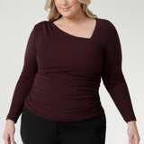 The double-layered bodice offers both structure and support, while the long sleeves make it a versatile piece for any season. Rich in colour and modern in design, the Simmi Top effortlessly moves from the office to after-dark occasions, all with breathable comfort and expert Australian craftsmanship.