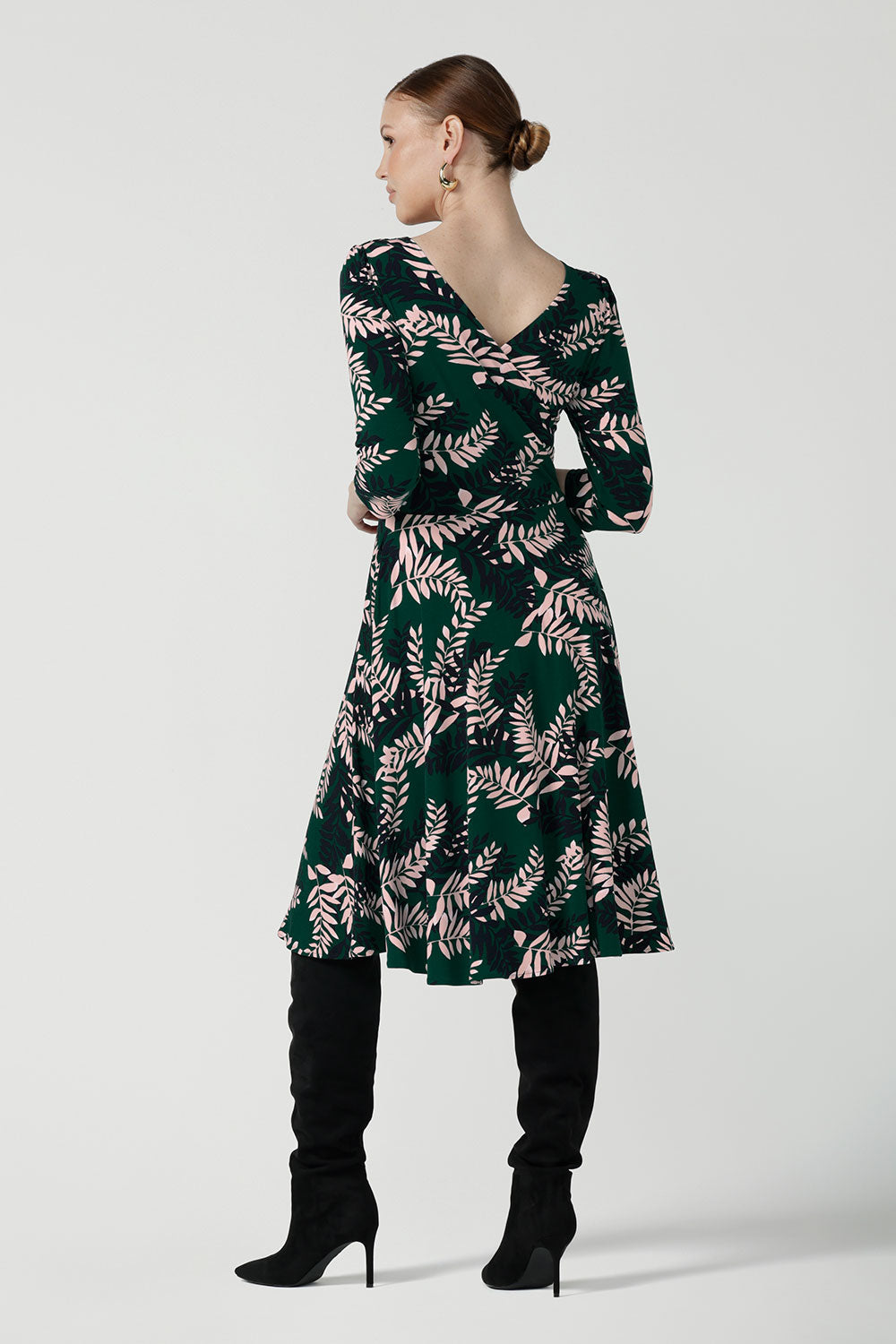 A size 10 woman wears the Simone Reversible dress in Alpine Fern. A comfortable jersey dress for women that is easy care. Made in Australia for women size 8 - 24.