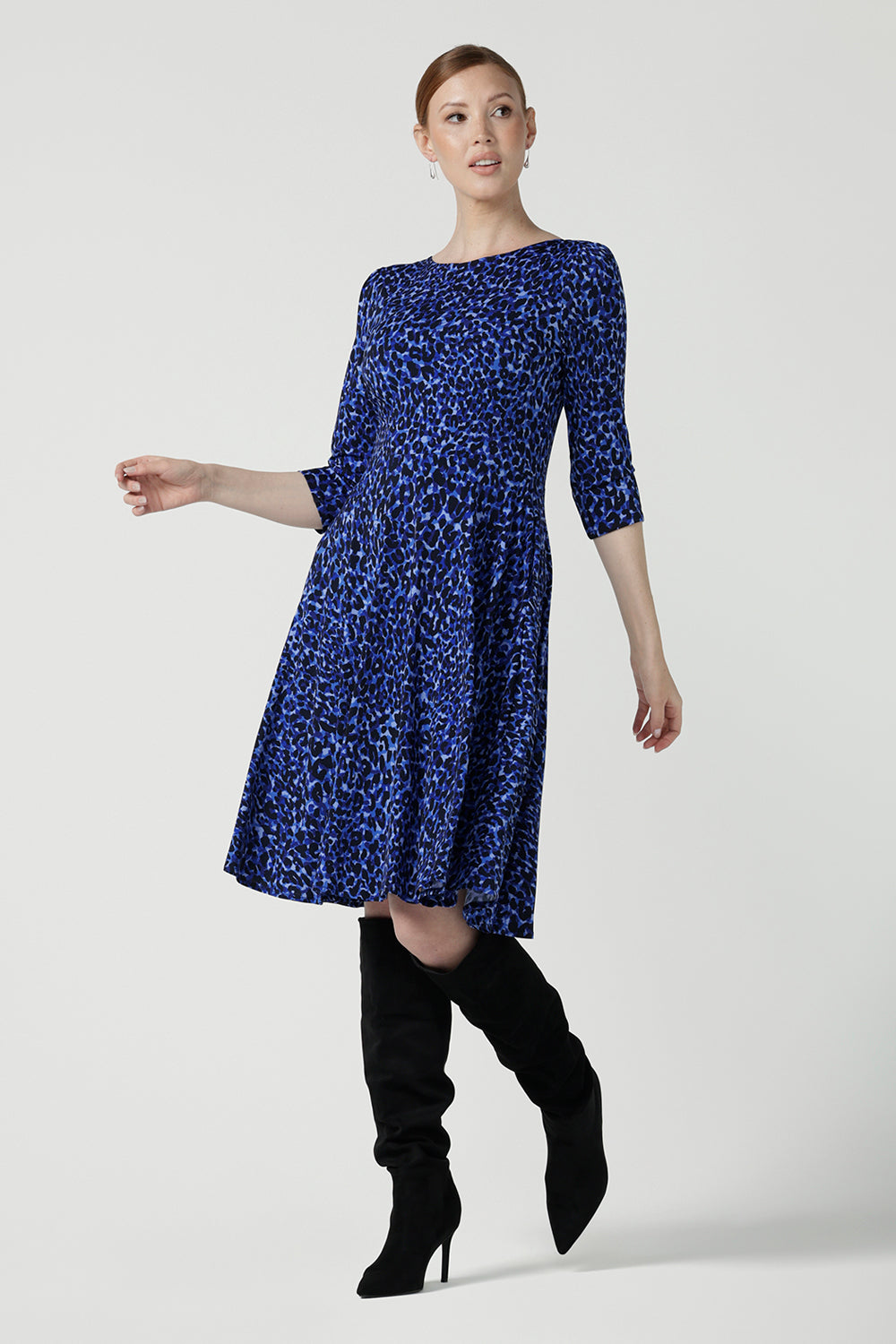 Simone reversible dress in cobalt Jaguar. Fixed wrap dress with blue printed animal print. Work to weekend and party dress. Comfortable jersey fabric. Made in Australia for women size 8 - 24.