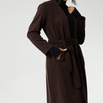 Elevate your wardrobe with the Sorel Trench Coat — a timeless, Australian-made essential designed for modern sophistication. Crafted from our premium Modal fabric, this trench delivers a luxurious feel with a soft, fluid drape and just the right amount of stretch for all-day comfort.