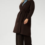 Elevate your wardrobe with the Sorel Trench Coat — a timeless, Australian-made essential designed for modern sophistication. Crafted from our premium Modal fabric, this trench delivers a luxurious feel with a soft, fluid drape and just the right amount of stretch for all-day comfort.