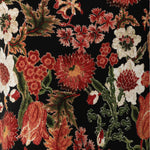 Crafted from dry-touch jersey fabric, this top features a stunning floral Tapestry Print on a black base, with rich shades of red, orange, pink, beige, and green. The fabric is stretchy, crease-resistant, and easy to care for, making it both practical and stylish. Tapestry printed fabric used by Leina & Fleur, a woman's fashion brand to create a collections of womans clothing, featuring tops, pants & dresses.