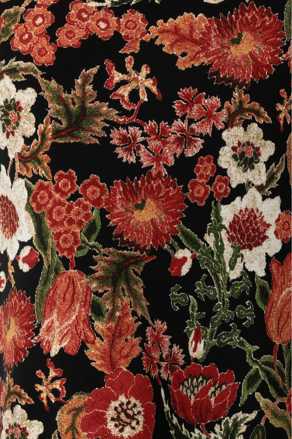 Crafted from dry-touch jersey fabric, this top features a stunning floral Tapestry Print on a black base, with rich shades of red, orange, pink, beige, and green. The fabric is stretchy, crease-resistant, and easy to care for, making it both practical and stylish. Tapestry printed fabric used by Leina & Fleur, a woman's fashion brand to create a collections of womans clothing, featuring tops, pants & dresses.