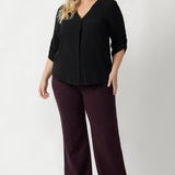 The shirttail hemline adds shape and versatility, perfect for both tucked or untucked styling. Available in sizes 8 to 24, the Terry Shirt comes in timeless Graphite or soft Vanilla. 