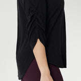 Black Tencel blouse with 3/4 ruched detailed sleeves add and elegant touch to classic black shirt. Available in sizes 8-24. 