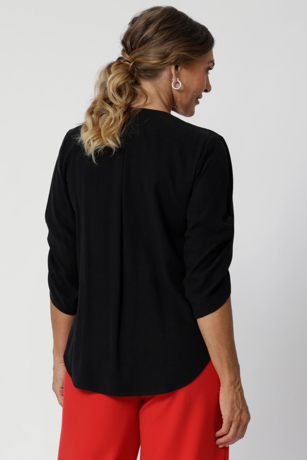 Available in sizes 8 to 24, the Terry Shirt offers a flattering fit for a variety of body types, making it a go-to choice for both style and comfort in the work.