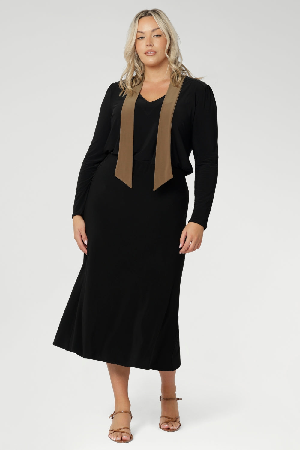 A curved shirttail hemline gives added versatility, allowing you to wear it tucked or untucked with ease. Proudly Australian made, the Thom Top is available in an inclusive size range from 8 to 24, delivering effortless sophistication and comfort for both workwear and special occasions.