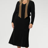 A curved shirttail hemline gives added versatility, allowing you to wear it tucked or untucked with ease. Proudly Australian made, the Thom Top is available in an inclusive size range from 8 to 24, delivering effortless sophistication and comfort for both workwear and special occasions.