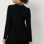Crafted from our signature dry touch, wrinkle-resistant jersey fabric, the Thom Top is as practical as it is stylish, with an easy care finish that makes it perfect for regular wear. The V-neckline is enhanced by the attached ties, while gathered detailing at the shoulders and a tailored back tuck through the shoulder yoke bring gentle structure and shape.