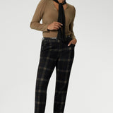 The soft V-neckline is accented by attached neck ties in a warm coffee tone, offering styling versatility—wear them tied for a polished office look or leave them loose for a more relaxed, contemporary feel. Full-length sleeves with gentle gathers at the shoulders add a touch of femininity, while the shoulder yoke and tailored tuck at the back create subtle shape without feeling structured.