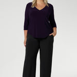 Made in Australia by Australian and New Zealand women's clothes brand, Leina & Fleur. This woman's jersey base top features a v neck, 3/4 sleeves and shirtail hem. Available in size 8-24.