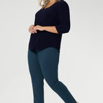 The Vida Top enhances curves with a smooth, tailored fit that feels as good as it looks. Seen from the back, the clean lines and elegant drape showcase its versatility and timeless appeal. Proudly made in Australia and available in inclusive sizes 8 to 24, the Vida Top is a must-have staple for every modern, confident woman.