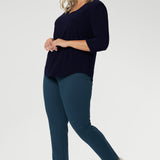 The Vida Top enhances curves with a smooth, tailored fit that feels as good as it looks. Seen from the back, the clean lines and elegant drape showcase its versatility and timeless appeal. Proudly made in Australia and available in inclusive sizes 8 to 24, the Vida Top is a must-have staple for every modern, confident woman.