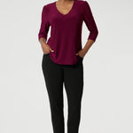 The back shoulder yoke and center-back gathers provide extra structure and comfort. The shirttail hemline offers a polished finish, making it ideal for both tucked-in and untucked styling.