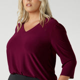 Available in sizes 8-24, the Vida Top in Ruby is designed to fit a range of body types, ensuring a flattering and comfortable fit for every woman. Australian made top is available in sizes 8-24.