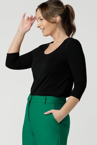 Side view of an elegant top for work and casual wear, this scoop neck, 3/4 sleeve top in black bamboo jersey is made in Australia by Australian and New Zealand women's clothing brand, Leina & Fleur. Shop comfortable work tops online in petite, mid size and plus sizes.