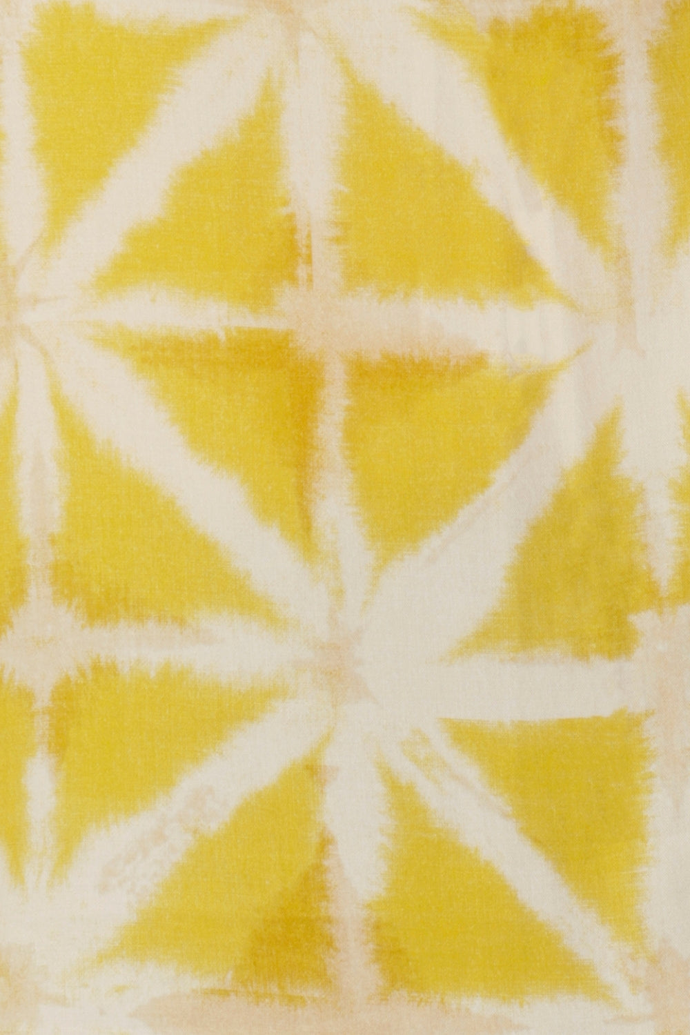 Image swatch of Yellow Shibori print used by Australian clothing brand Leina & Fleur to make a brightly coloured collection of workwear garments for ladies, stocked in sizes 8 through to 24. 